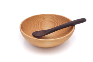 small wood bowl with small wooden spoon