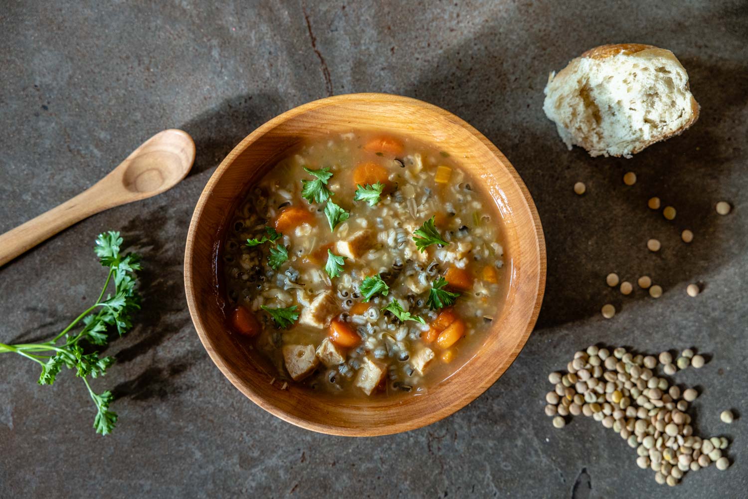 wood soup bowl with hearty soup