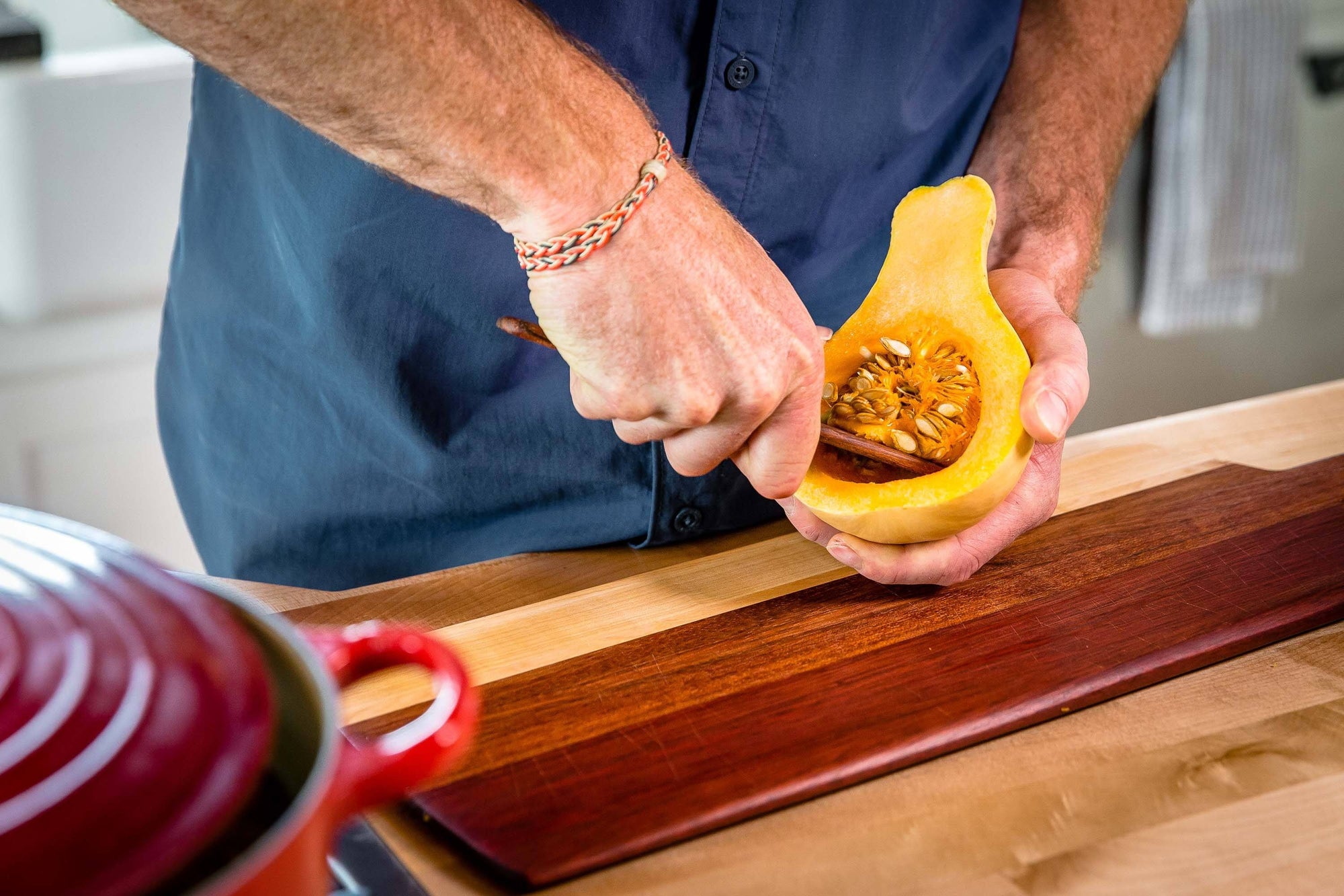 wood condiment spreader and icing smoother digging seeds from squash - Earlywood