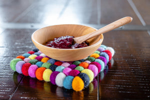 wooden baby bowl with baby food